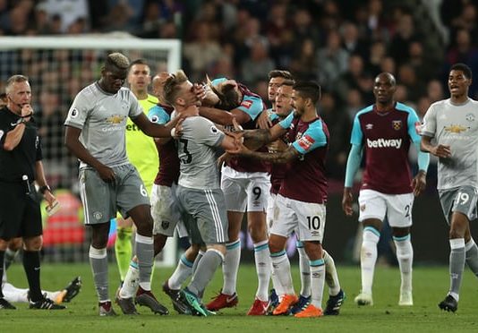Tempers flare as Manchester United seal second with draw at West Ham